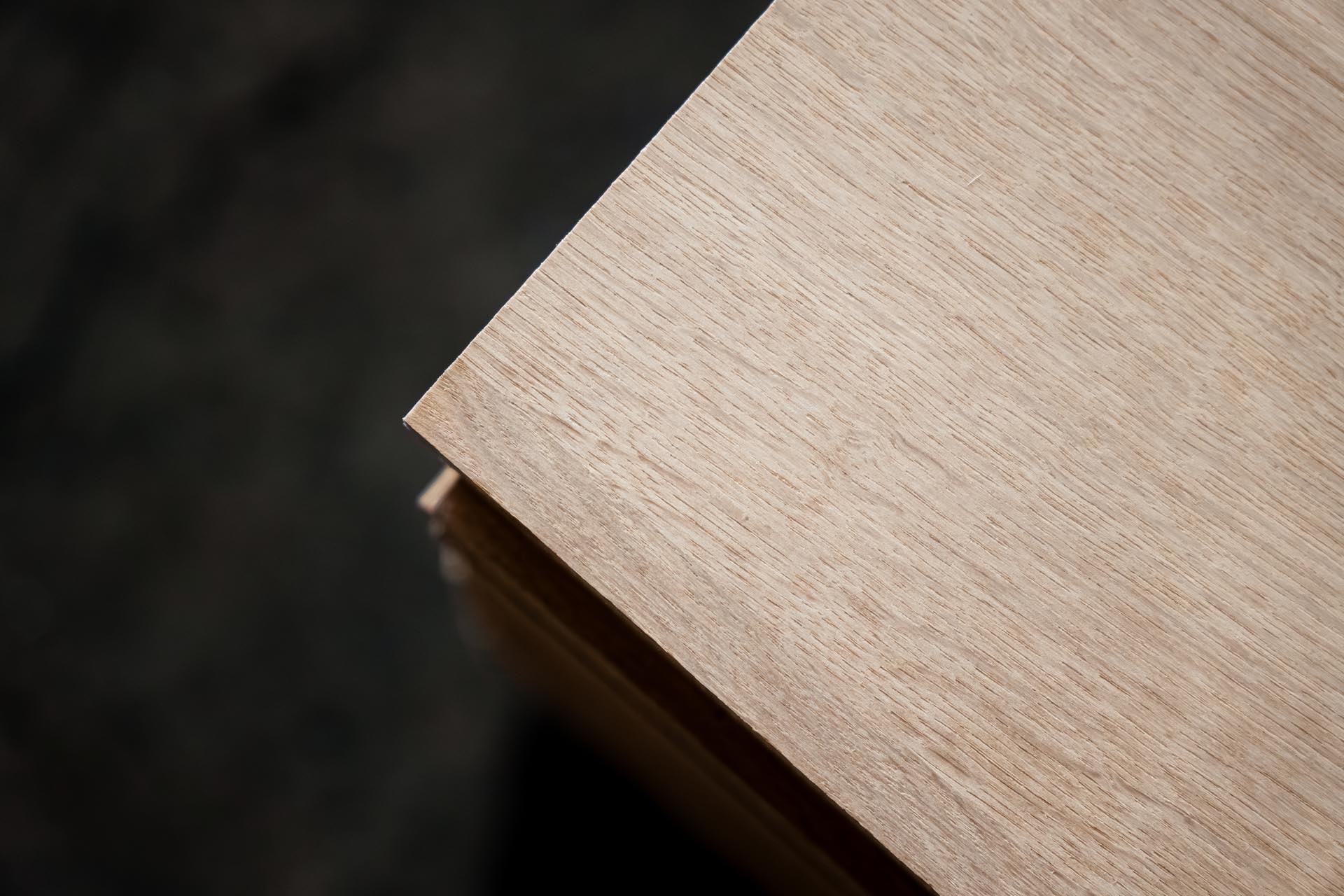 corner of a stack of plywood from above