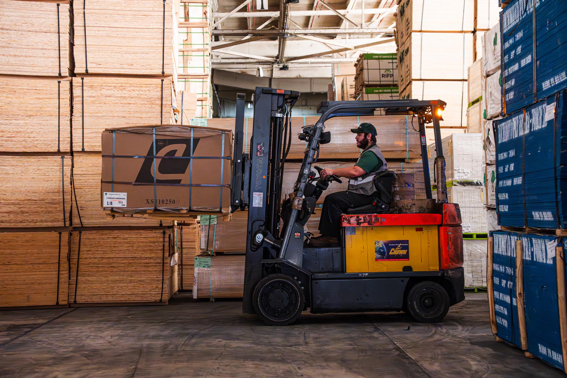 forklift carrying wood product