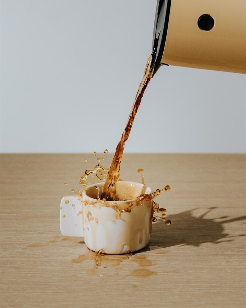 Coffee spilling on Master Oak tabletop