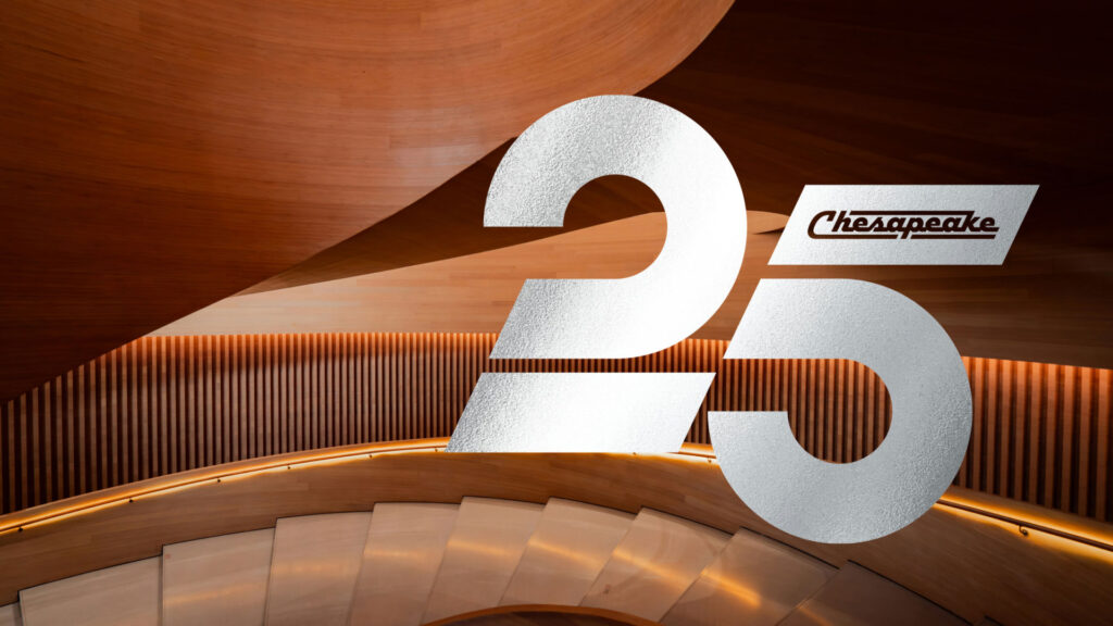 Chesapeake 25th Anniversary Branding over architectural wood background